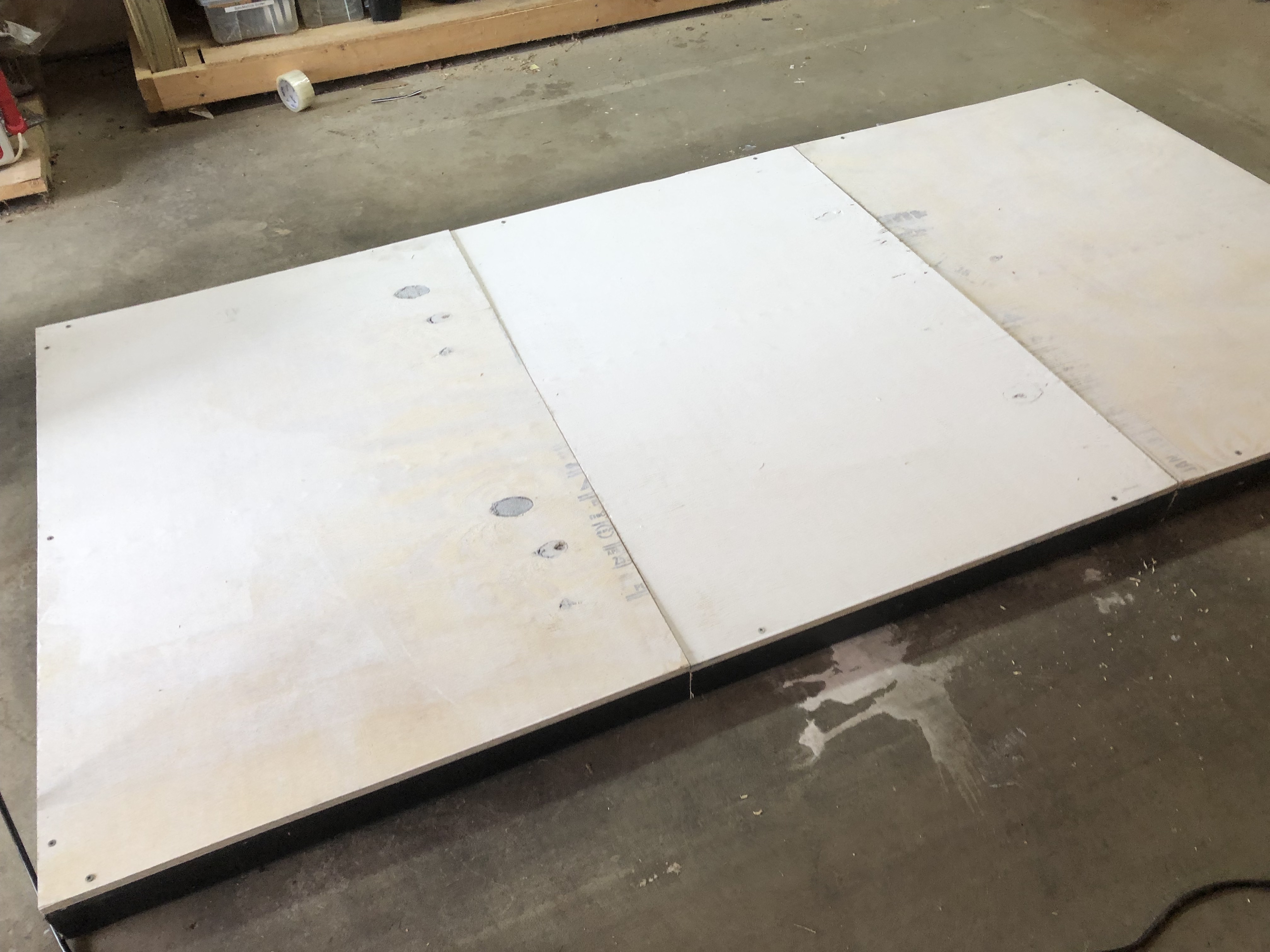 Flipped table for bottom hinge assembly